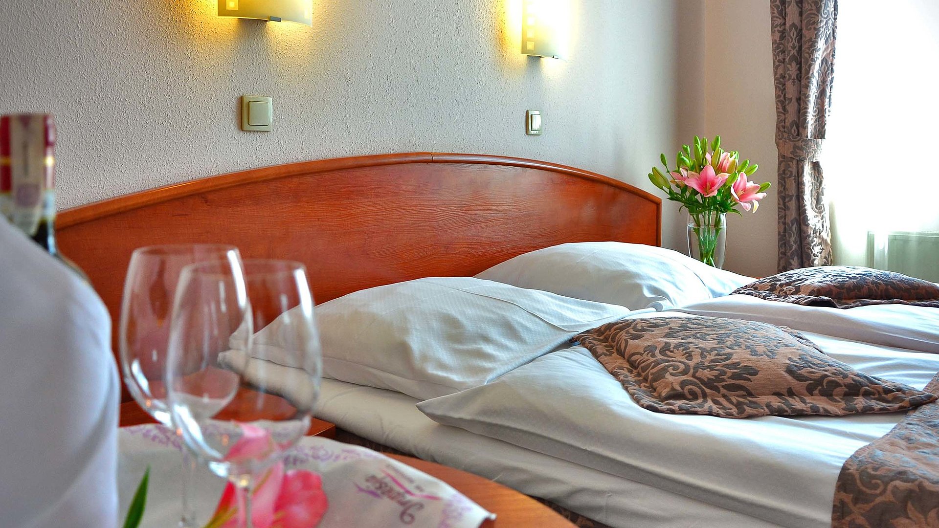 Pauschalangebote für Ferienunterkünfte am Chiemsee - Hotelzimmer mit Doppelbett